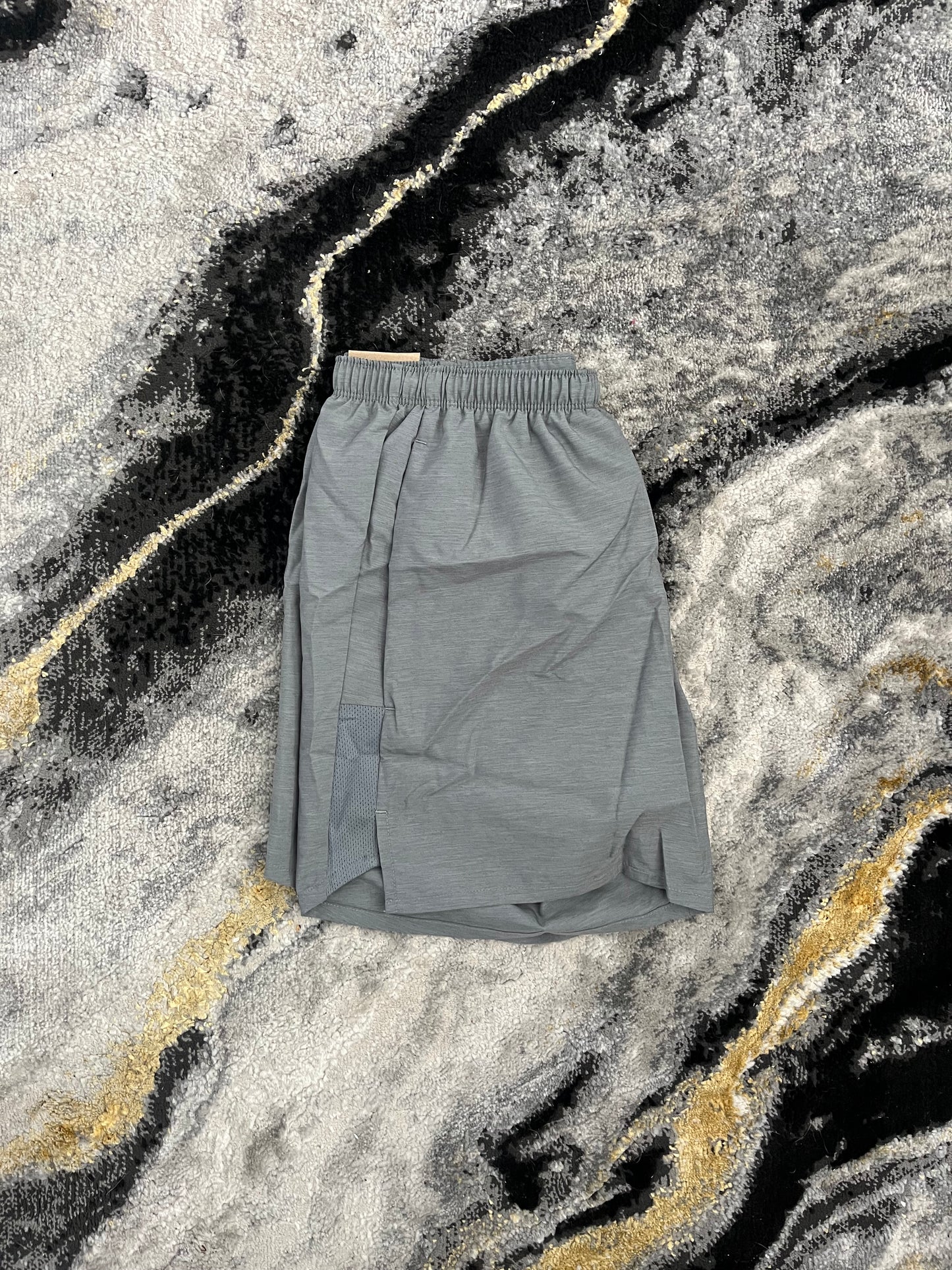 Nike Challenger Running Shorts in Grey – Lightweight and breathable activewear left side view