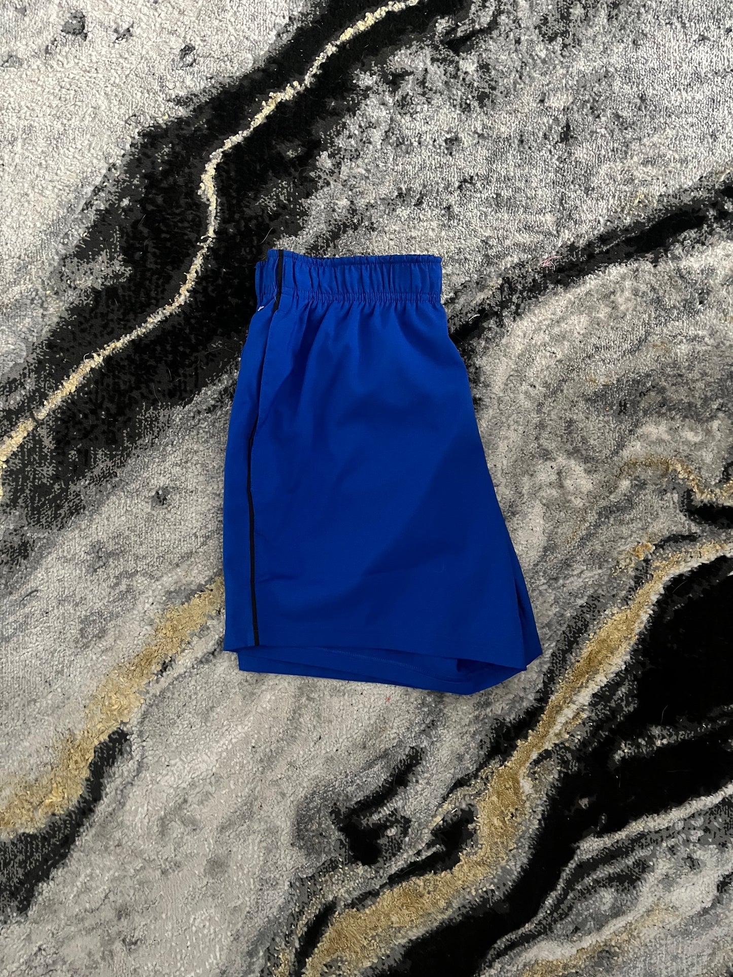 new balance shorts blue right view